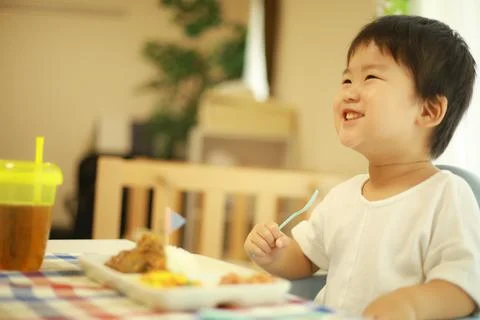 Boy eating Foto stock