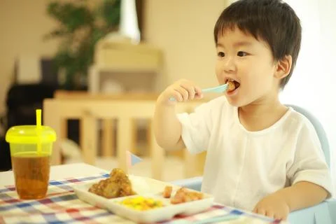 Boy eating Stock Photos