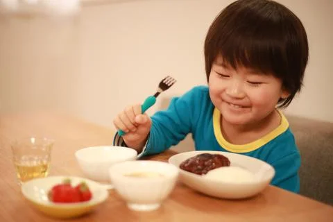 Boy eating Stock Photos