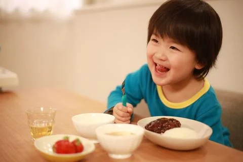 Boy eating Stock Photos