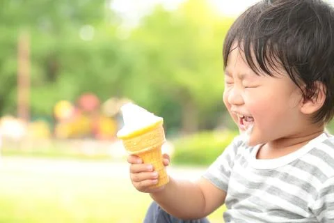 Boy eating soft serve Stock Photos