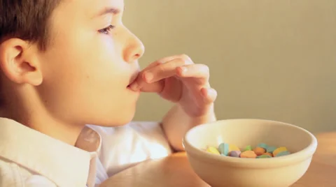 Boy Eating Valentine's Candy Stock Footage 34282516