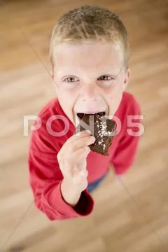 Boy Eatng Chocolate Cake