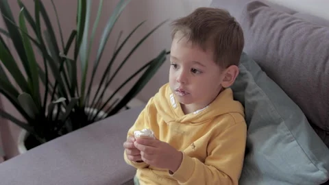 A Boy eats ice cream. 스톡 동영상 138645472