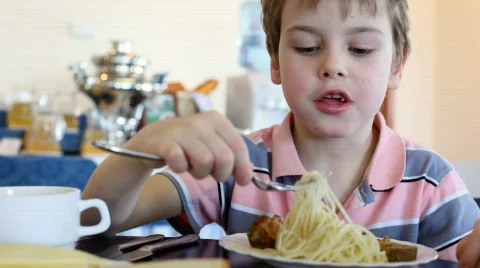 Boy eats noodle Stock Footage 374511
