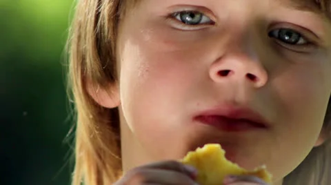 Boy eats pancakes(portrait ) Stock Footage 25358285