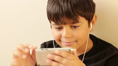 Boy With Electronics ipod2.mp4 Video stock 28294182