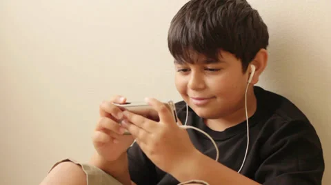 Boy With Electronics ipod2.mp4 Video stock 28299888
