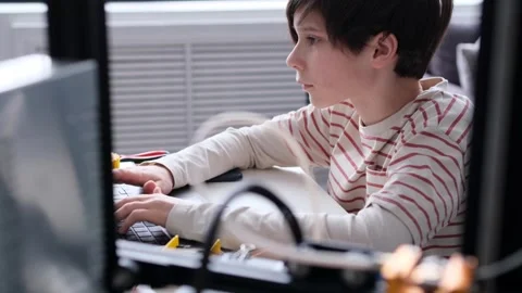 Boy Engaged On E-Learning And Work With 3D Printer Stock Footage 266786277