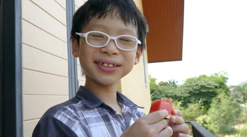 Boy enjoy eating watermelon Stock Footage 64201282