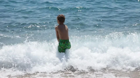Boy enjoying the sea Stock Footage 24804913