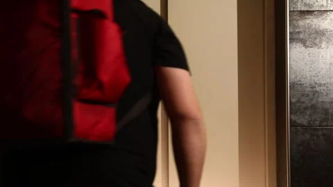 The boy enters the elevator 1 Stock Footage 311763388