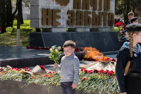 Boy at the Eternal flame Stock Photos