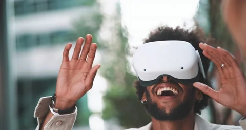 Boy experimenting virtual reality in the business district Stock Footage 201674225