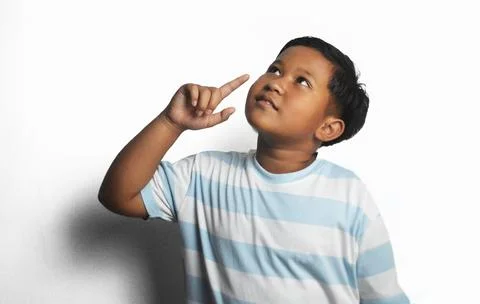 Boy expression thinking about something Stock Photos