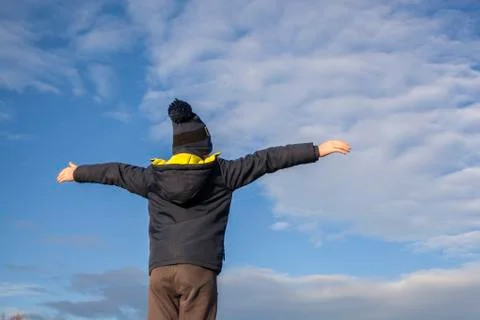 Boy with extended arms Stock Photos