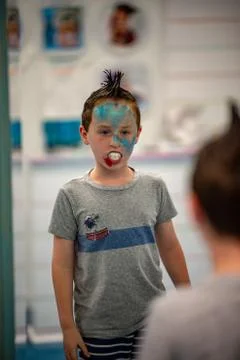 Boy with face painted like a shark Stock Photos