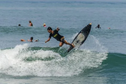 Boy falls surfing 스톡 사진