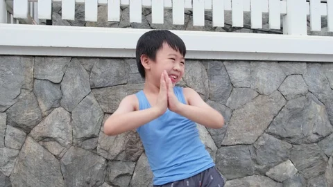 Boy feeling happy for clapping hands and dancing Stock Footage 128100419
