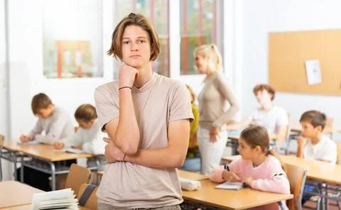 Boy feeling upset after getting bad mark at school Stock Photos