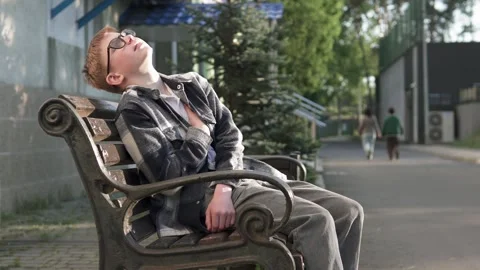 Boy feels sharp pain in heart after school bullying. Concepts of heart failure. 库存影片 312199883