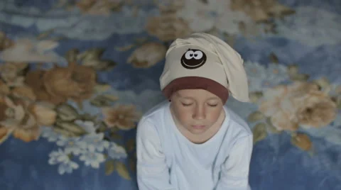 A boy fell asleep while sitting on the couch. Stock Footage 62636330