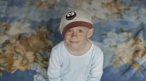 A boy fell asleep while sitting on the couch. Stock Footage 62640612