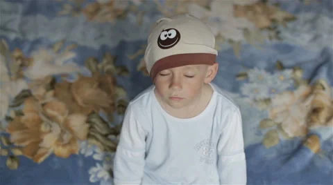 A boy fell asleep while sitting on the couch. Stock Footage 62732035