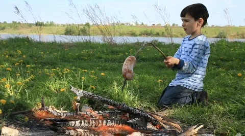 The boy,  fire Stock Footage 746522