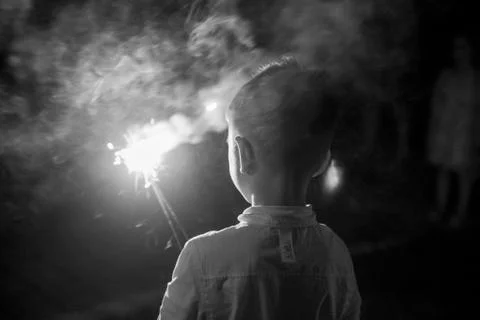 Boy with firecrackers Stock Photos