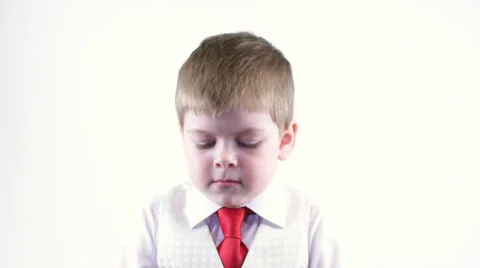 Boy first sad, then smiles 스톡 동영상 37204580