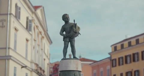 Boy with fish statue on Marshal Tito Square Stock Footage 334243127