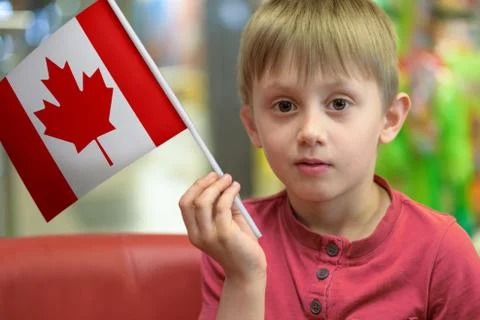 Boy with the flag of Canada Stock Photos