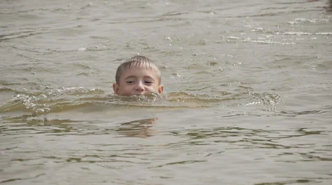 Boy floating in the river Stock-Footage 66459073