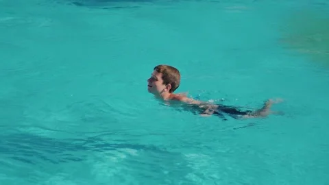 Boy floats slow motion Stock Footage 146279623
