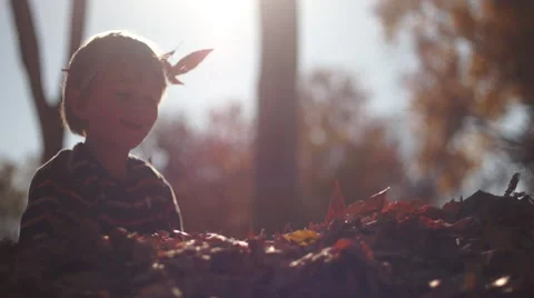 Boy Flops into Leaves Video stock 50300215