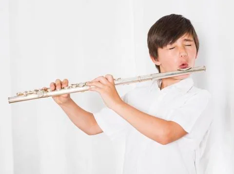 Boy with flute Stock Photos