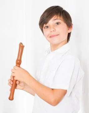 Boy with flute Stock Photos