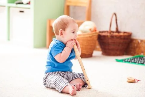 Boy with flute Stock Photos