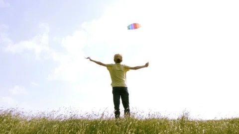 A boy flying in blue sky with some clouds. Stock Footage 109617108