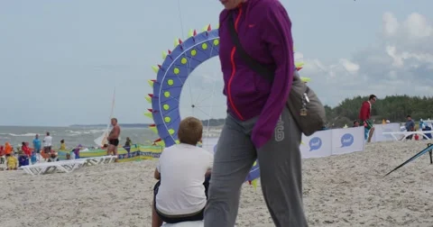 A Boy Flying a Kite - People Preparing Their Kites And Air Swimmers or flying Stock Footage 54215100
