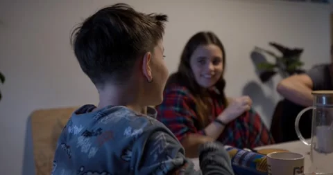 The boy is focused on mobile gaming. Stock Footage 326874697