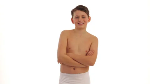 Boy with folded arms in the bathroom Stock Footage 24630813