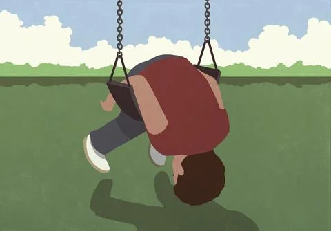 Boy folded over swing on playground Ilustração Stock