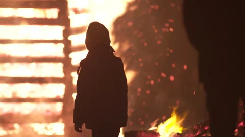 Boy in front of a burning tower Stock Footage 267009576