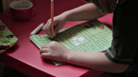 BOY IN FRONT OF THE DESK Stock Footage 68755606