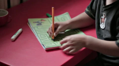 BOY IN FRONT OF THE DESK Stock Footage 68755861
