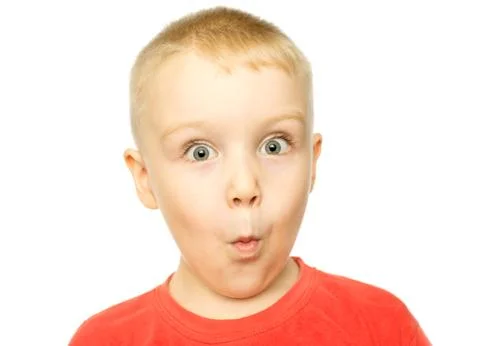 Boy with funny amazed expression Stock Photos