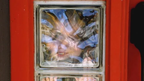 Boy Funny Faces Glass Blocks Stock Footage 96464530