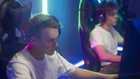 Boy Gamer Loses Round In E-Sport Team Competition At Cyber Arena With RGB Lights Video stock 179610559